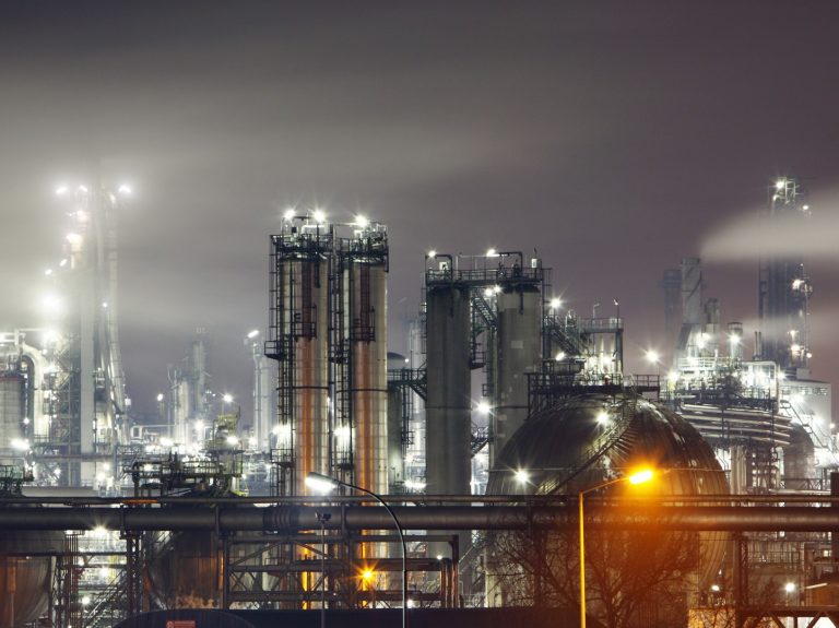 Refinery illuminated at night
